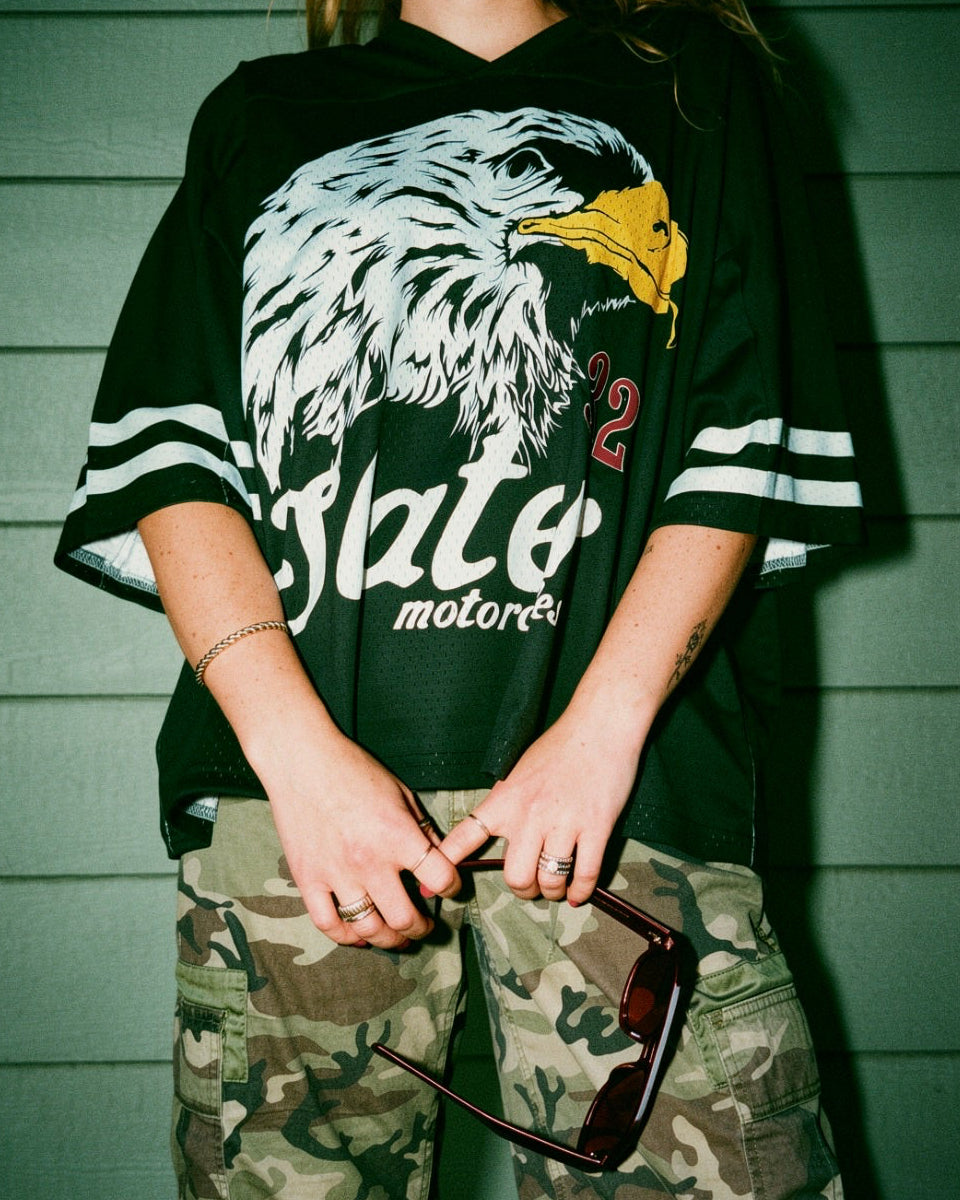 Jersey with eagle on woman with flash
